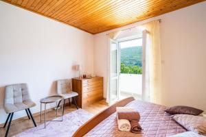 Posteľ alebo postele v izbe v ubytovaní Marija Apartment