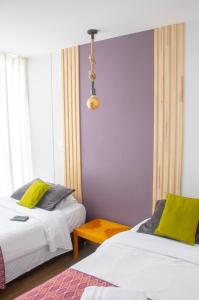 Krevet ili kreveti u jedinici u okviru objekta Apartahotel Millennials