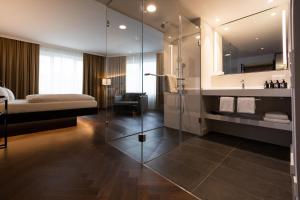 Postel nebo postele na pokoji v ubytování GINN City & Lounge Yorck Berlin