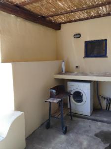 Kuchyň nebo kuchyňský kout v ubytování Casetta Malvasia