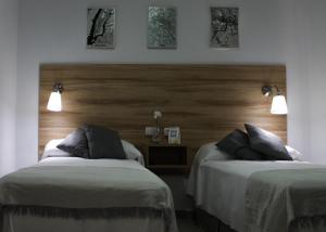 Postel nebo postele na pokoji v ubytování Hotel Restaurante Vía Sevilla - Cádiz by MA 22 Puntos