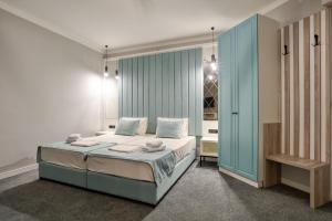 Montenegrina Hotel & SPA All-Inclusive客房内的一张或多张床位