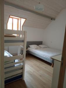 Posteľ alebo postele v izbe v ubytovaní Jolie maison de ville en bord de Neste 8/9 pers