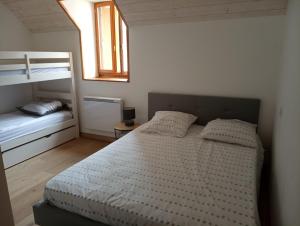 Posteľ alebo postele v izbe v ubytovaní Jolie maison de ville en bord de Neste 8/9 pers + 11 fotografií