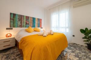 Postel nebo postele na pokoji v ubytování Exclusivo Piso Granada, PARKING PRIVADO OPCIONAL