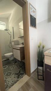 Koupelna v ubytování Apartments Milas