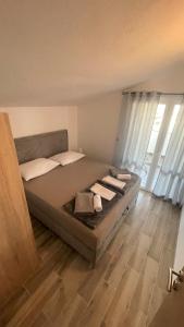 Postel nebo postele na pokoji v ubytování Apartments Milas
