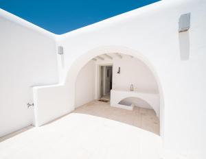 Postel nebo postele na pokoji v ubytování Hyperion Villa by LLB Mykonos