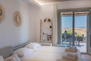 Posezení v ubytování Hyperion Villa by LLB Mykonos