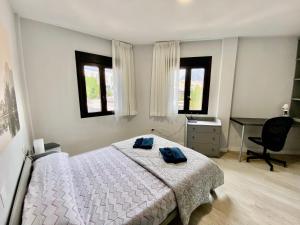 Cama o camas de una habitación en Duplex tres habitaciones en el Galeon de Adeje