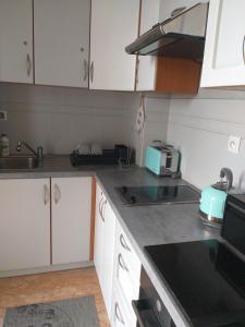 Kuchyňa alebo kuchynka v ubytovaní Apartament na nowej starówce