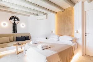 Postel nebo postele na pokoji v ubytování Hyperion Villa by LLB Mykonos