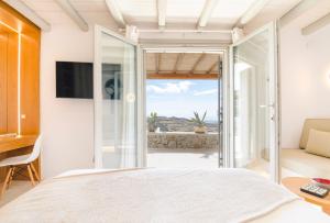 Postel nebo postele na pokoji v ubytování Hyperion Villa by LLB Mykonos