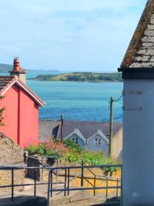 a view of the ocean from a house at Sea View Cottage, 2 bedrooms with stunning views in Cobh