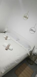 Llit o llits en una habitació de Apartman Dalmacija 8 fotos més