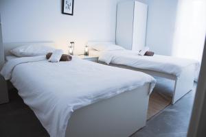 Llit o llits en una habitació de Apartman Dalmacija