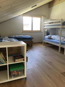 Postel nebo postele na pokoji v ubytování Chalet Sternenhimmel
