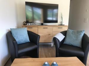 TV a/nebo společenská místnost v ubytování Chalet Sternenhimmel