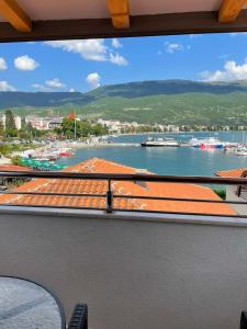 a view of a harbor from a window of a ship at Villa Fortuna in Ohrid