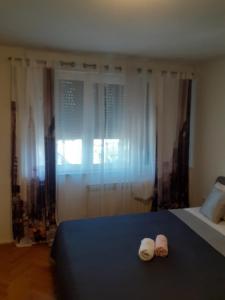 Posteľ alebo postele v izbe v ubytovaní Apartman Sweet penthouse self check-in