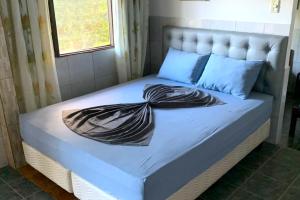 Postel nebo postele na pokoji v ubytování Hotel Pousada Rancho Fundo