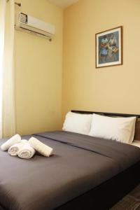 Posteľ alebo postele v izbe v ubytovaní Globy SeaView Apartments Kavala