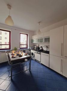 Kuchyňa alebo kuchynka v ubytovaní Apartament Francuska Pokoje Rooms