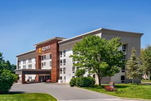 a rendering of the front of a hotel at La Quinta Inn by Wyndham Columbus Dublin in Dublin