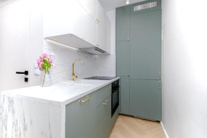 Kuchnia lub aneks kuchenny w obiekcie Apartament w sercu Gdyni