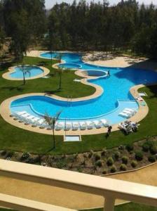 Bazén v ubytování Lugar encantador en condominio en Mirasol nebo v jeho okolí