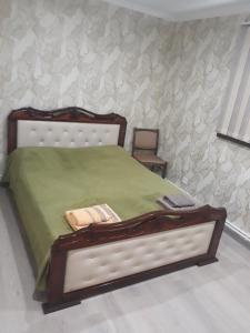 Posteľ alebo postele v izbe v ubytovaní GuestHouse