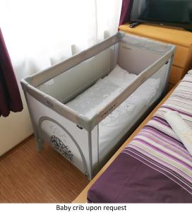Posteľ alebo postele v izbe v ubytovaní Paradise Apartment
