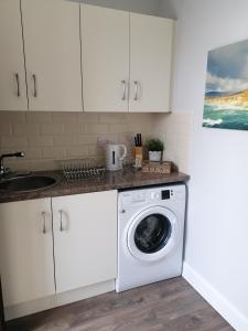 Kuchyň nebo kuchyňský kout v ubytování Atlantic way Apartment 1