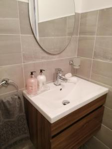 Ένα μπάνιο στο Atlantic way Apartment 1