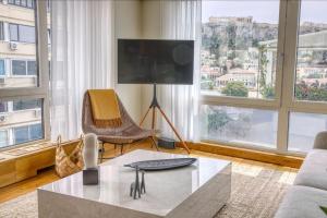 Posedenie v ubytovaní Sunny Luxury Loft,Stunning Acropolis View, Jacuzzi