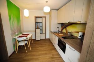 Kjøkken eller kjøkkenkrok på Greenland Apartments