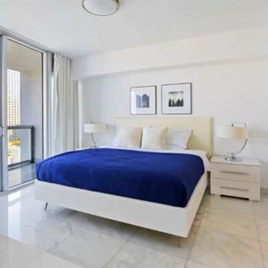 Ένα ή περισσότερα κρεβάτια σε δωμάτιο στο Vacation Apartment for Couples in Miami