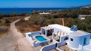 an aerial view of a house with a swimming pool at Villa Echedra in Vlychada