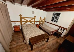Cama ou camas em um quarto em Hostería Austral