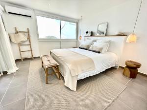 Postel nebo postele na pokoji v ubytování Appartement Aqua Nanda