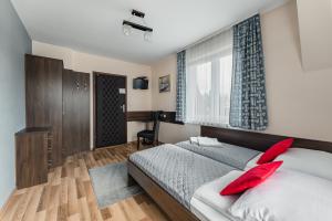 Posteľ alebo postele v izbe v ubytovaní Magdalenka 5 min pieszo od Kotelnicy
