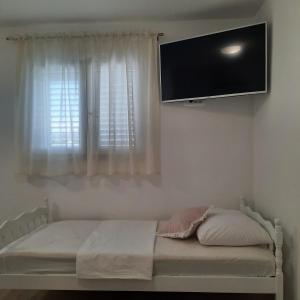 Posteľ alebo postele v izbe v ubytovaní Studio apartman Mare