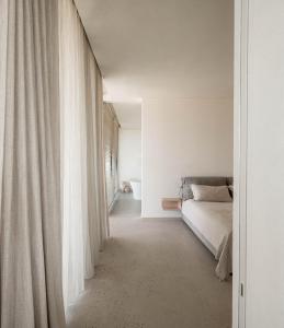Postel nebo postele na pokoji v ubytování Monte Piccolo B&B