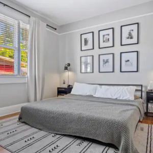 a bedroom with a large bed and a window at Family Vacation Home in Tampa, Florida in Tampa