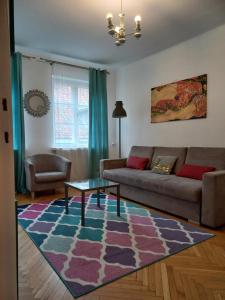 Posedenie v ubytovaní APARTAMENTY-MI PLAC ZAMKOWY