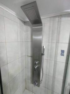 a shower with a shower head in a bathroom at VIEW OF CASTLE in Monemvasia