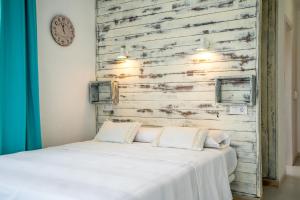 Postel nebo postele na pokoji v ubytování LOS NAREJOS Hotel