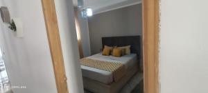 Postel nebo postele na pokoji v ubytování Residence Anas Kelibia + 10 fotografií