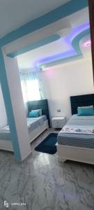 Cama o camas de una habitación en Residence Anas Kelibia