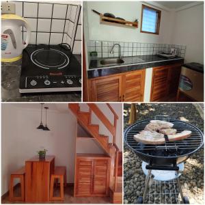 a kitchen with a stove and a table with some food at White Bada Guesthouse in Siquijor